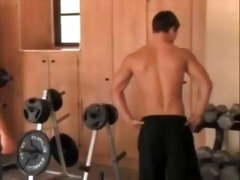 Muscled gay guys working out