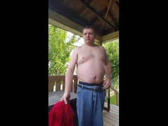 Chubby boy strips naked on back porch